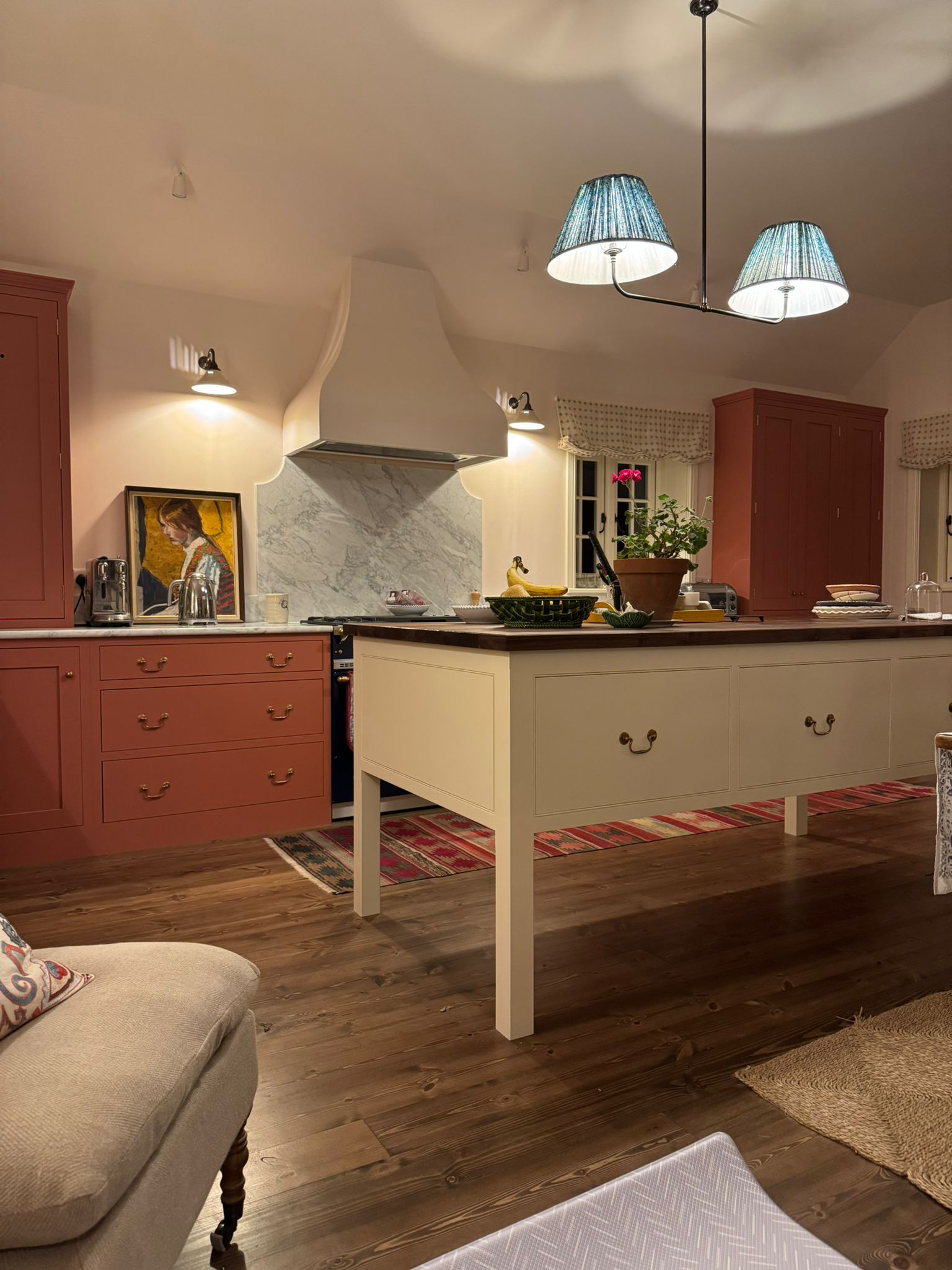 Painted kitchen cabinetry in an open-plan kitchen