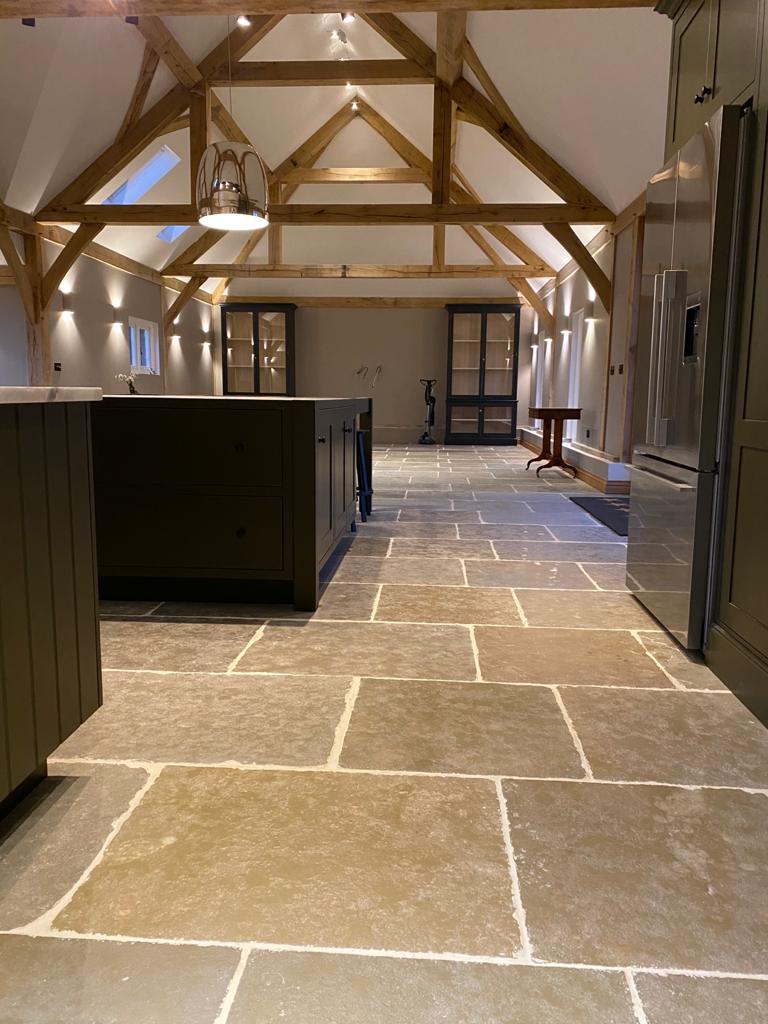 Hallway with glazed display cabinets leading to the kitchen